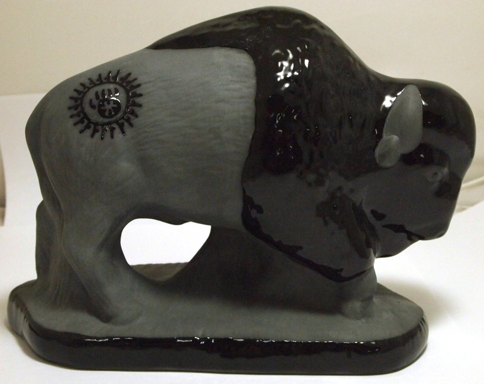 San Juan Pueblo Black Pottery Buffalo - Brenda Adelicia: San Juan Pueblo Black Pottery Buffalo - Brenda Adelicia Height: 6 Maximum Width: 8-1/2 Maximum Depth: 4" Our shipping costs for pottery are $8.99 within the U.S. SKU: pt0207"