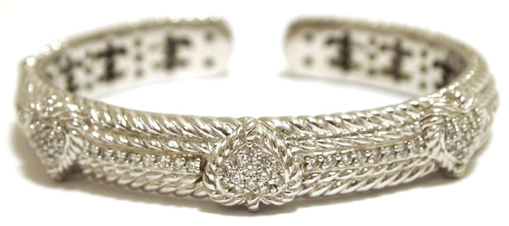Old Pawn Sterling Silver & Cubic Zirconia Hearts Cuff B: Old Pawn Sterling Silver & Cubic Zirconia Hearts Cuff Bracelet - Judith Ripka Measures 6-1/2 around with a 1/4" gap (bracelet opens, full gap is 1-5/8"), 7/16" wide. Weight: 44.2g SKU: br1726"