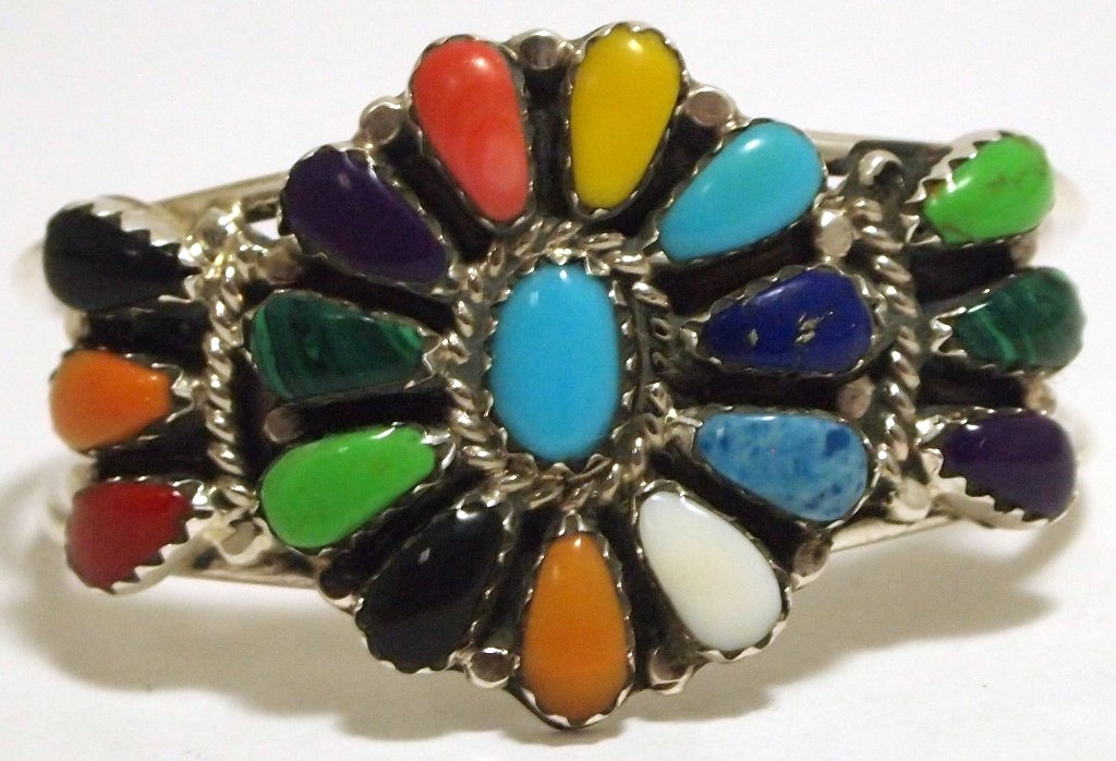 Navajo Multi-Stone Sterling Silver BABY Cuff Bracelet -: Navajo Multi-Stone Sterling Silver BABY Cuff Bracelet - Lisa Williams Measures 4-1/4 around with a 1/2" gap, 1" wide. Stones present: Lapis Lazuli, Denim Lapis, Malachite, Sugilite, Turquoise, Coral.