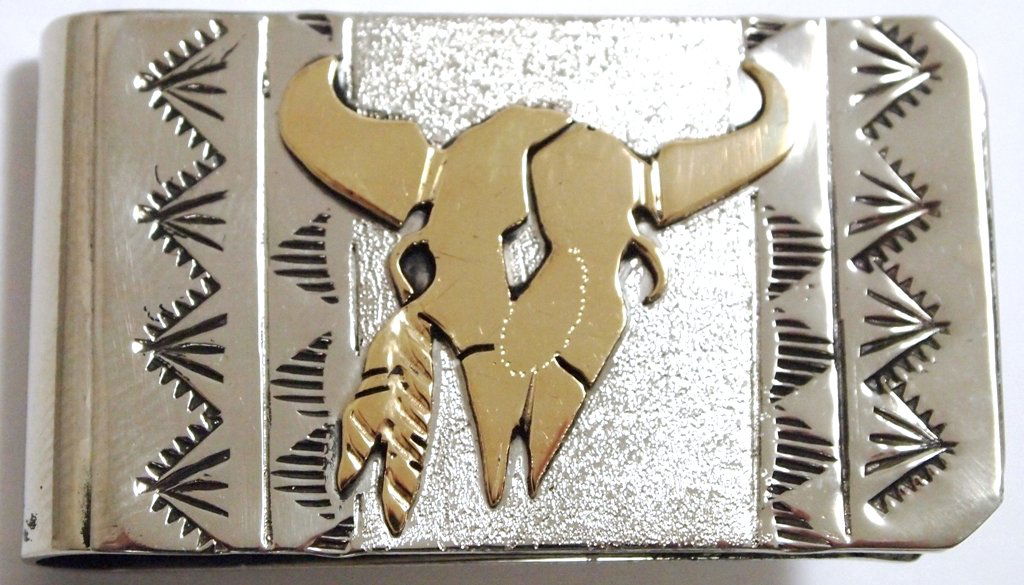 Navajo 12k Gold Fill over Sterling Silver Cow Skull: Navajo 12k Gold Fill over Sterling Silver Cow Skull Money Clip - Roger Jones Measures 1-3/4 tall by 1" wide.Note: Money clips are nickel or stainless steel as purchased by the artist. The work on top