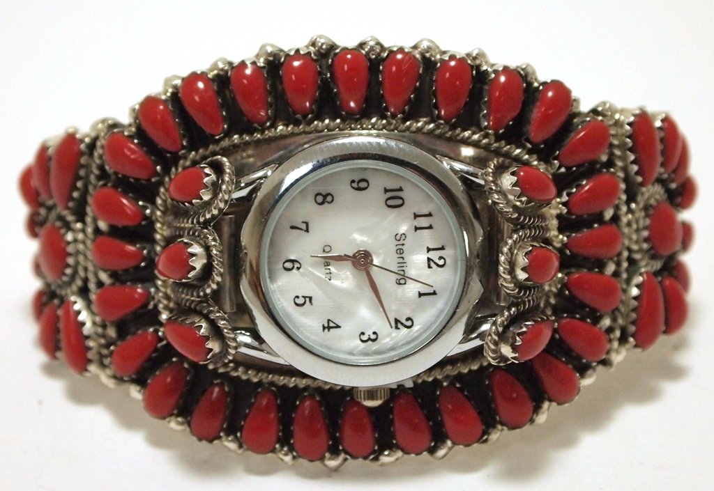 Navajo Coral Sterling Silver Cuff Bracelet Women's: Navajo Coral Sterling Silver Cuff Bracelet Women's Watch - Juliana Williams Measures 5-1/4" around with a 1-3/8" gap, 1-5/8" wide. Watch face is stainless steel, new and working perfectly. Weight: 42.