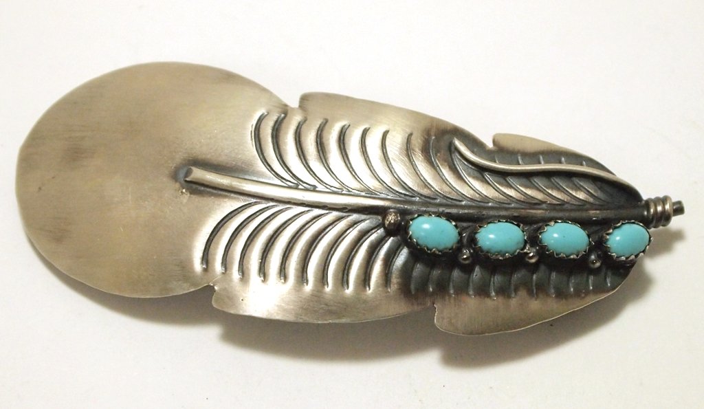Navajo Turquoise Sterling Silver Feather Hair Barrette: Navajo Turquoise Sterling Silver Feather Hair Barrette - Tim Yazzie Measures 1-1/8 tall by 3" wide. Weight: 13.2g SKU: hb0059"