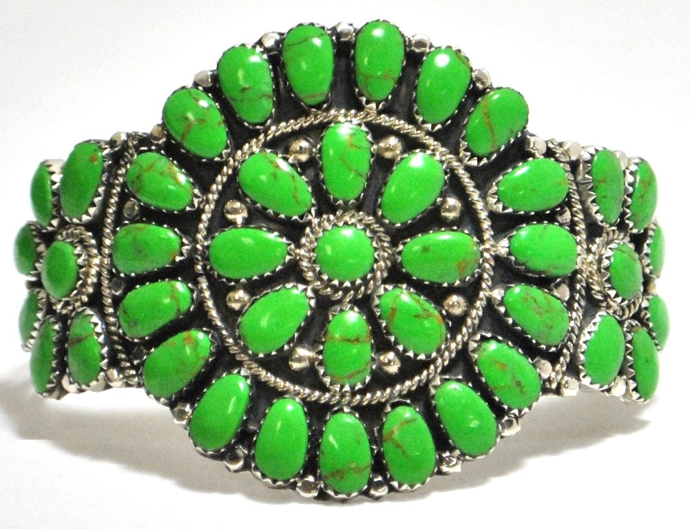 Navajo Green Turquoise Cluster Sterling Silver Cuff: Navajo Green Turquoise Cluster Sterling Silver Cuff Bracelet - Juliana Williams Measures 5-1/4 around with a 1-1/4" gap, 2" wide. Weight: 31.3g SKU: br0553"