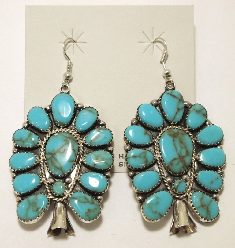 Navajo Turquoise Sterling Silver Squash Blossom French: Navajo Turquoise Sterling Silver Squash Blossom French Hook Earrings - Danny Waundee Measure 2-5/8 tall by 1-3/8" wide. Weight: 17.4g SKU: ea0836"