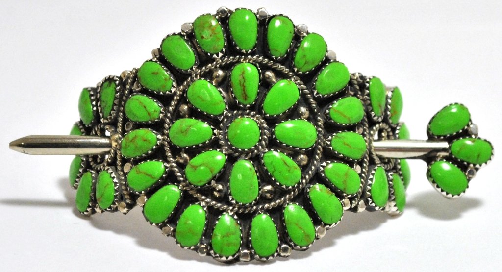 Navajo Green Turquoise Cluster Sterling Silver Hair: Navajo Green Turquoise Cluster Sterling Silver Hair Barrette - Juliana Williams Measures 2 tall by 2-3/4" wide by 1" deep excluding pin. Pin measures 3/4" wide by 3-3/4" long. Weight: 28.2g SKU: hb001
