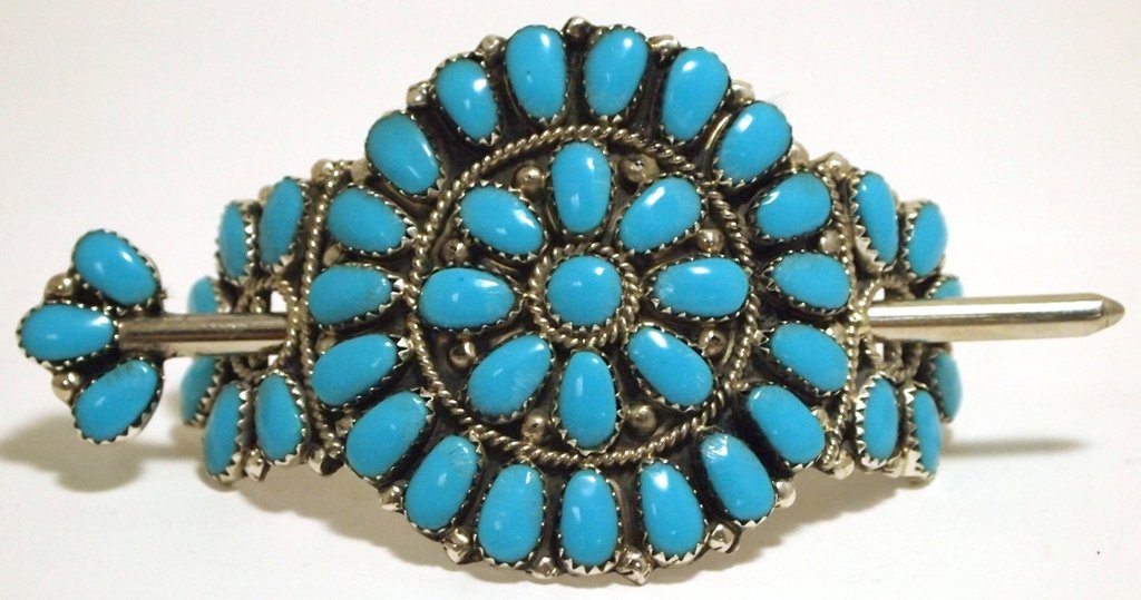 Navajo Turquoise Cluster Sterling Silver Hair Barrette: Navajo Turquoise Cluster Sterling Silver Hair Barrette - Juliana Williams Measures 2 tall by 2-3/4" wide by 1" deep excluding pin. Pin measures 3/4" wide by 3-3/4" long. Weight: 25.9g SKU: hb0024"