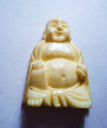 CARVED IVORY BUDDHA: CARVED IVORY BUDDHA