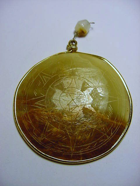 CARVED ALABASTER AZTEC CALENDAR PENDANT: CARVED ALABASTER AZTEC CALENDAR PENDANT