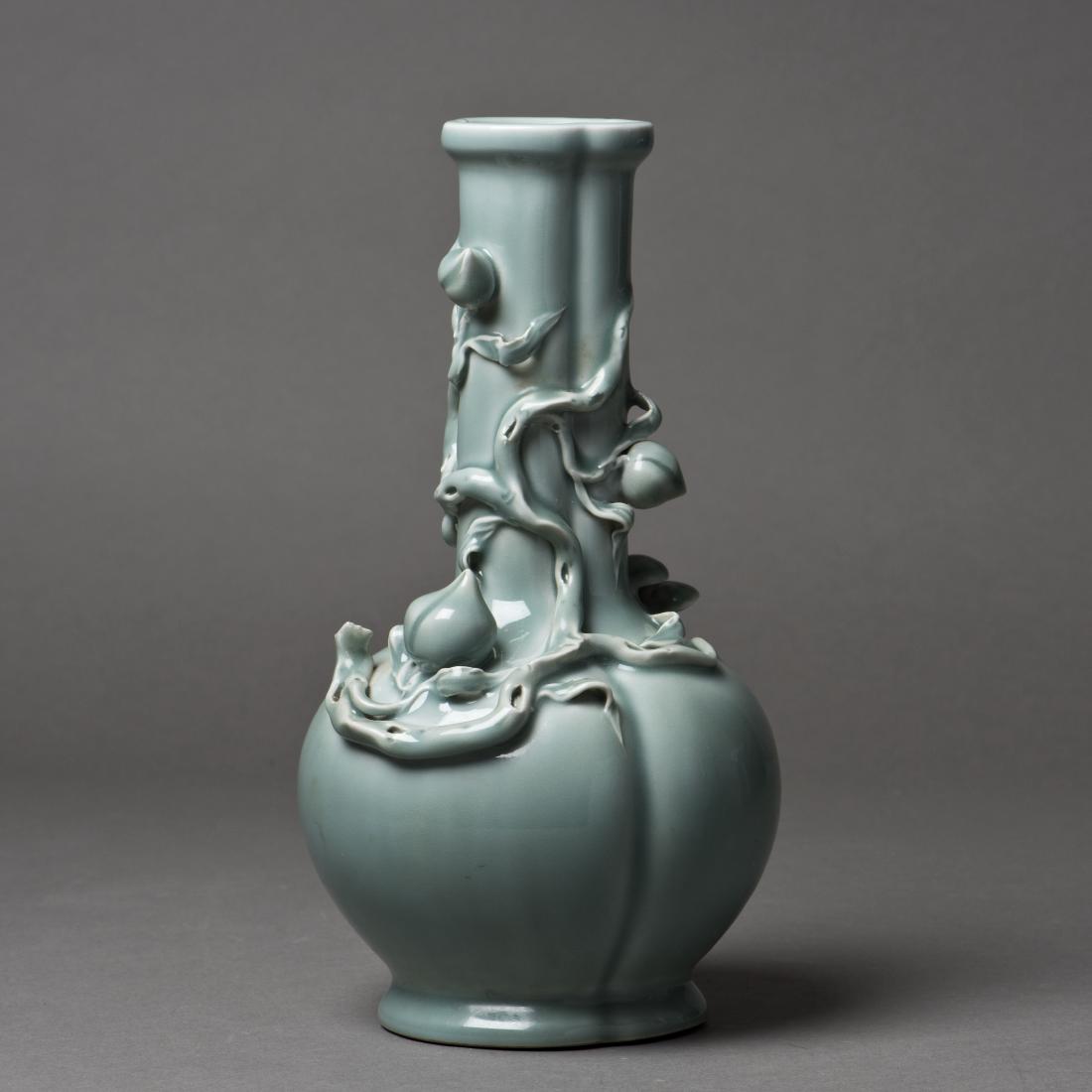 A CELADON PORCELAIN VASE WITH PEACH RELIEF (1 of 5)
