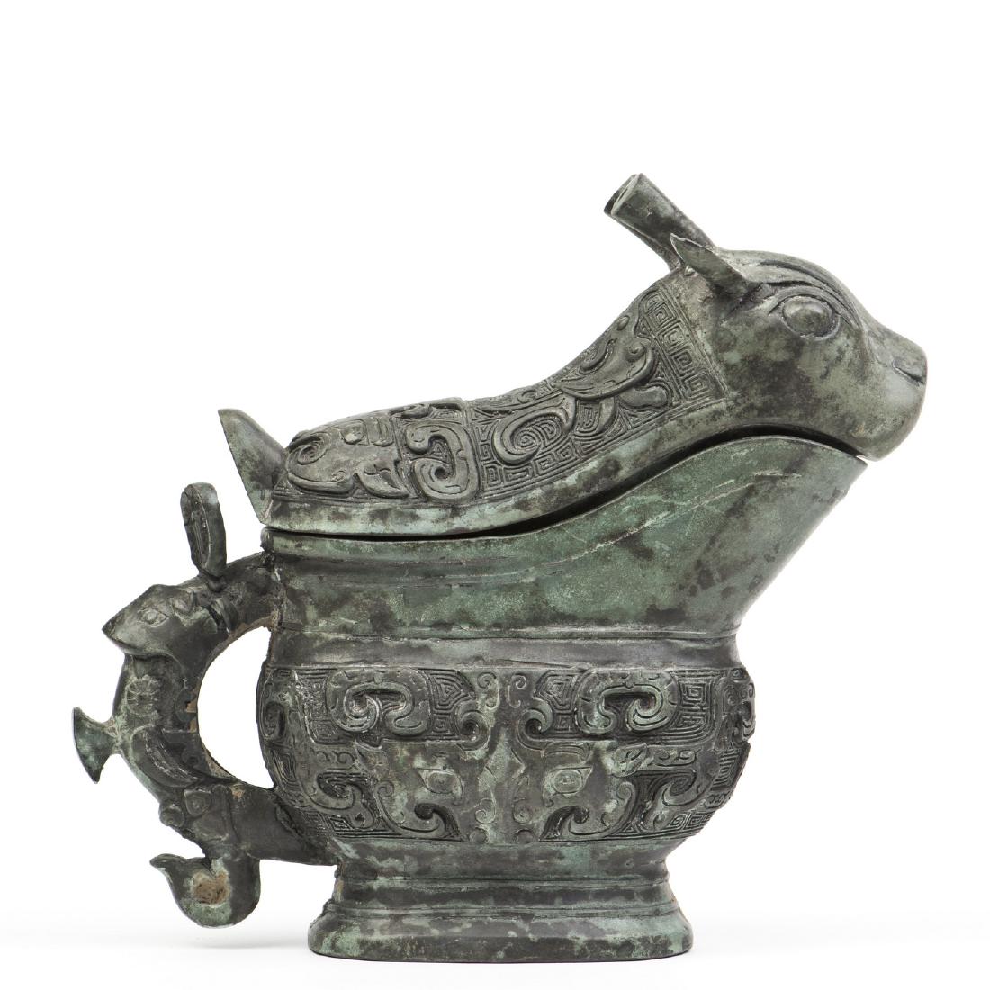 A DECORATIVE CHINESE BEAST-SHAPED BRONZE (1 of 4)