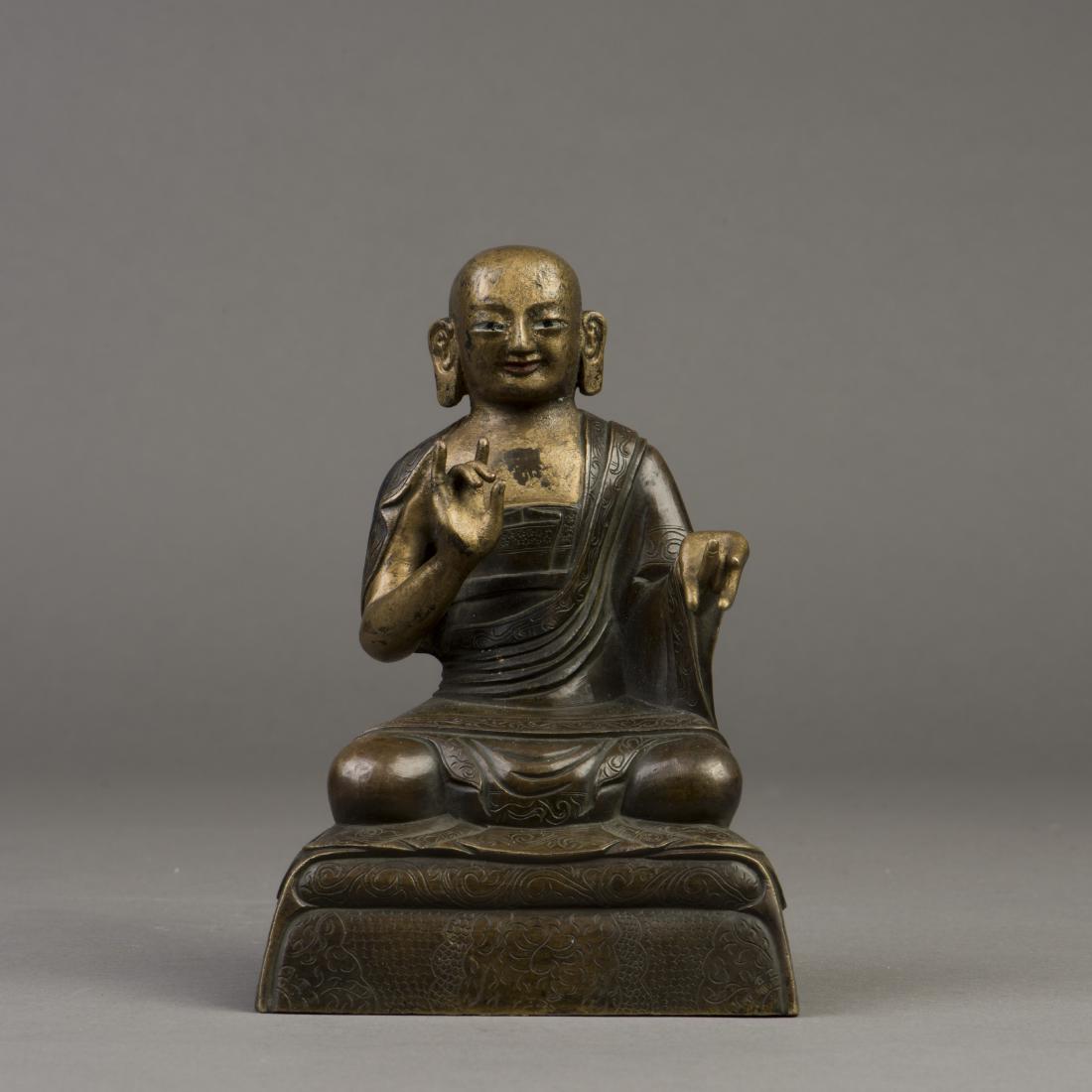 A GILT BRONZE SCULPTURE OF BUDDHA (1 of 6)