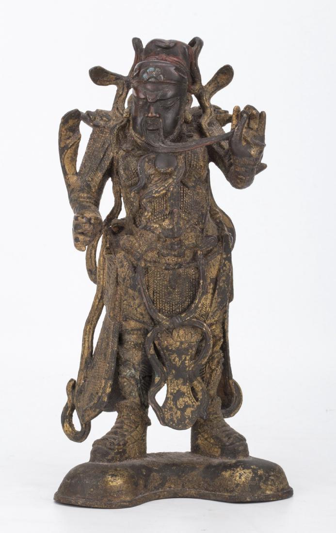A CHINESE LAO SHAN WARRIOR BRONZE: The authentic Lao Shan warrior bronze statue with raised hands, bronze with actual aged bronze patina. Length 5.25'' Width 3.25'' Height 10.25''
