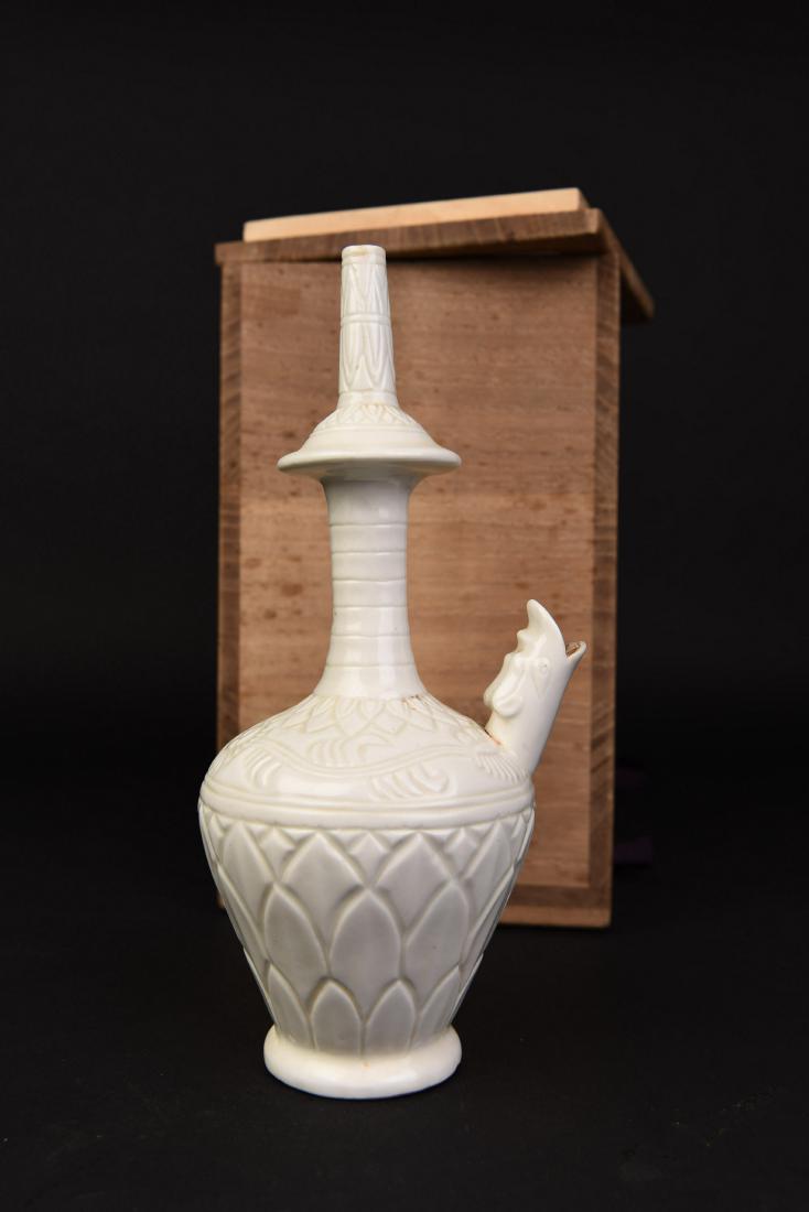 A SMALL VASE OF DING WARE (1 of 4)