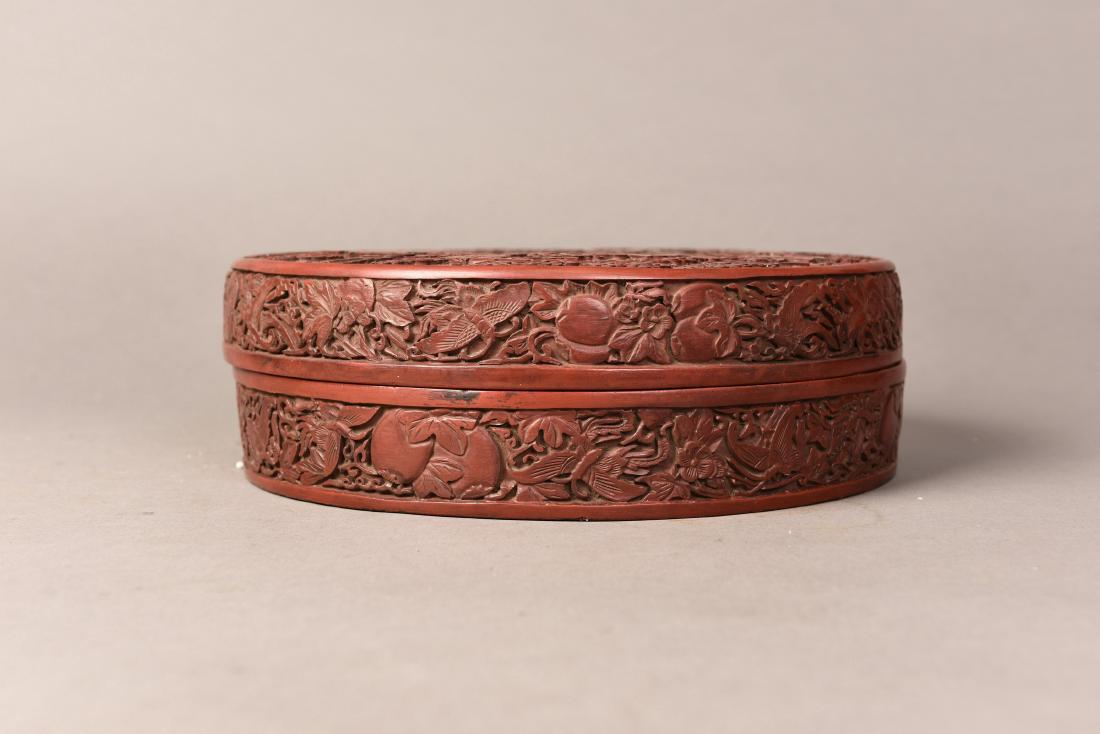 A RED LACQUER ROUND BOX AND COVER (1 of 4)