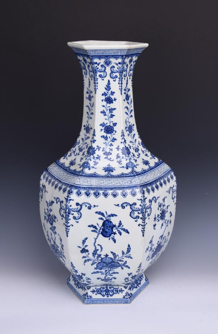 A CHINESE BLUE AND WHITE HEXAGONAL VASE (1 of 10)