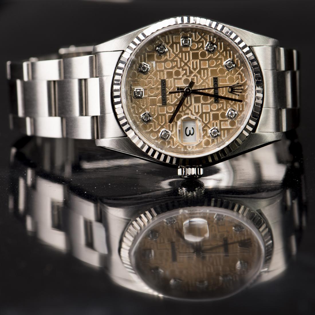 A ROLEX WATCH (1 of 2)