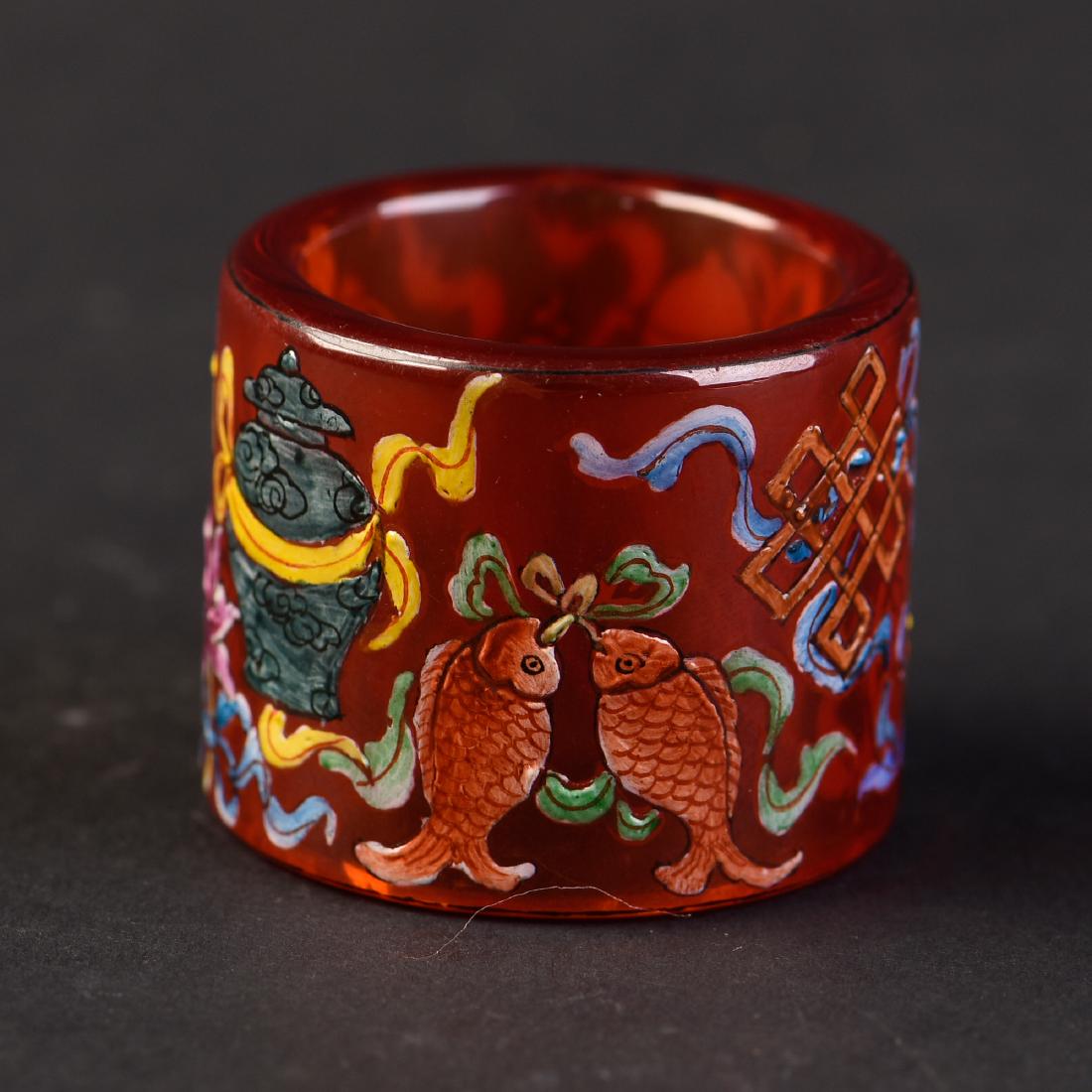 A PEKING GLASS THUMB RING (1 of 4)