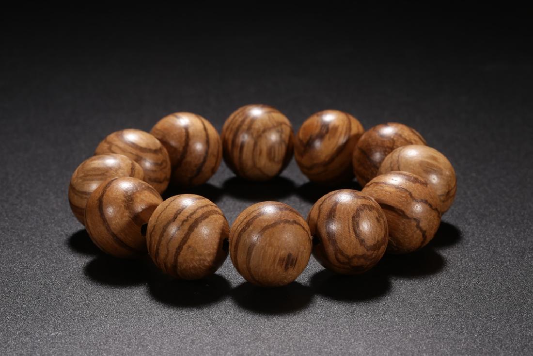A STRING OF CHENXIANG BEADS (1 of 8)