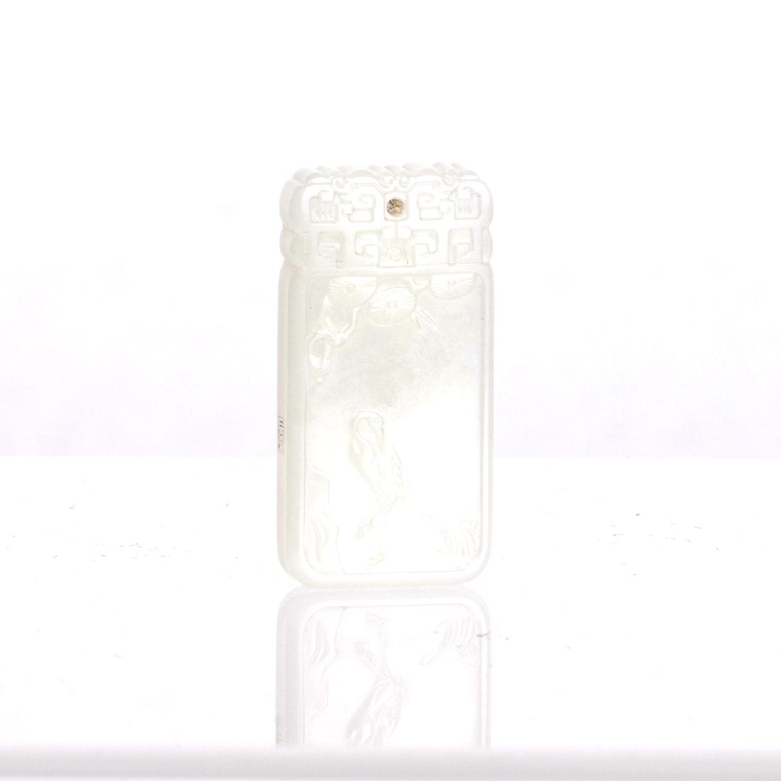 A WHITE JADE PENDANT CARVED WITH CRANE (1 of 2)