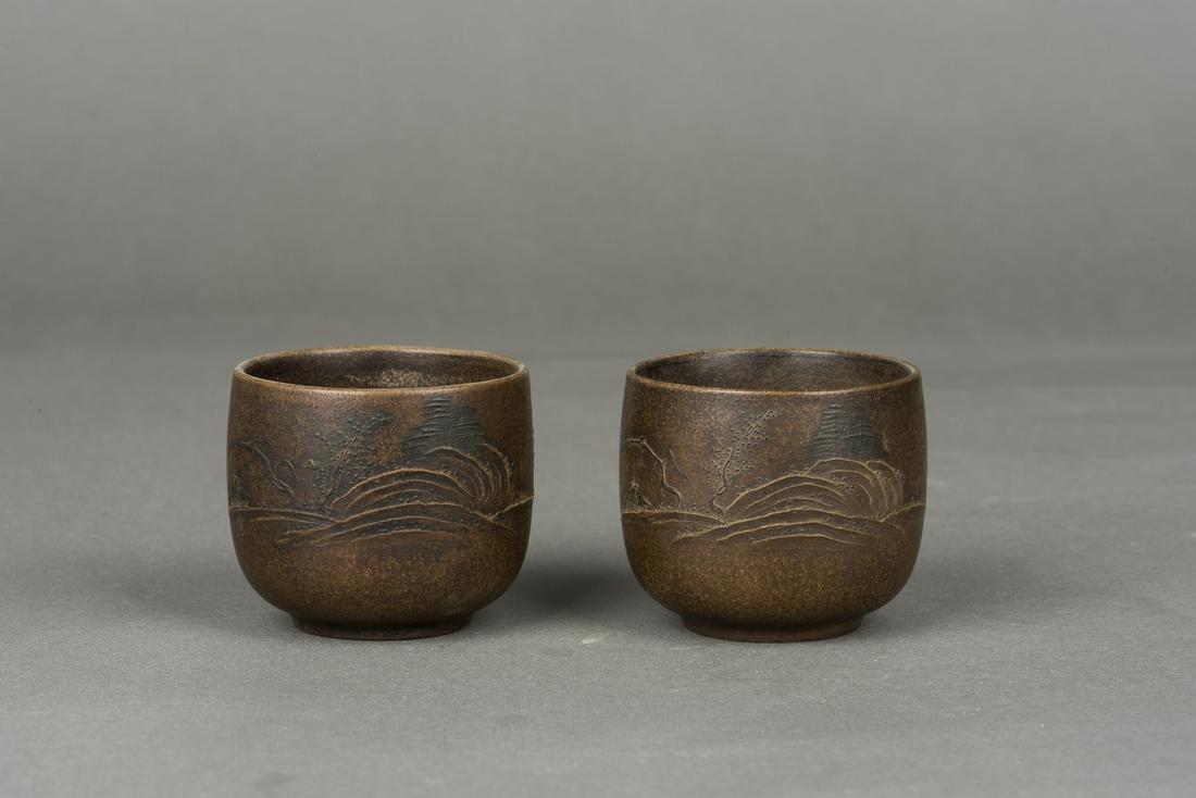 A PAIR OF ZISHA CUPS (1 of 3)