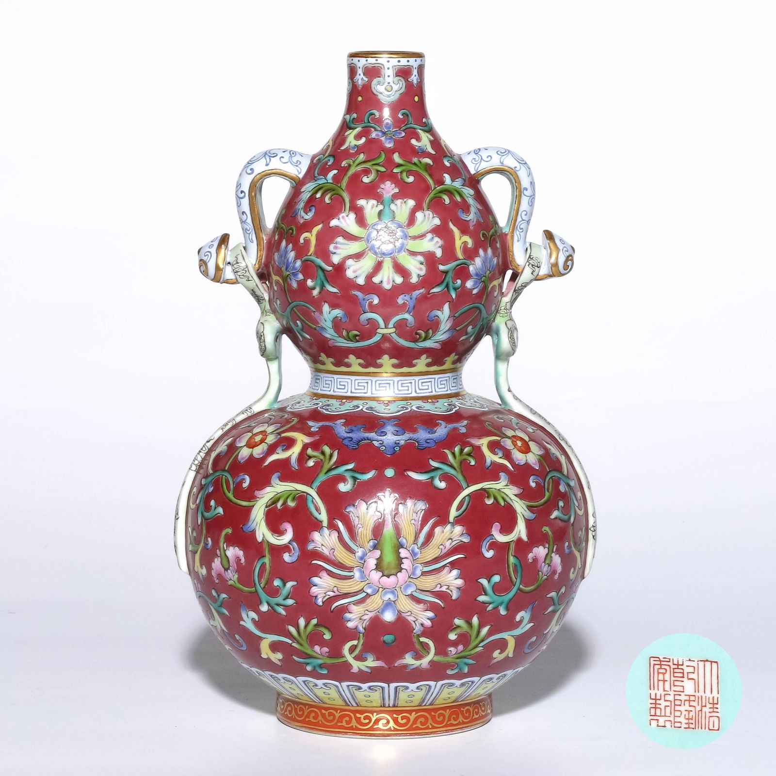 A FAMILLE ROSE FLORAL SCROLL GOURD VASE, QIANLONG MARK (1 of 7)