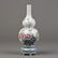 A FAMILLE ROSE PORCELAIN VASE OF GOURD FORM