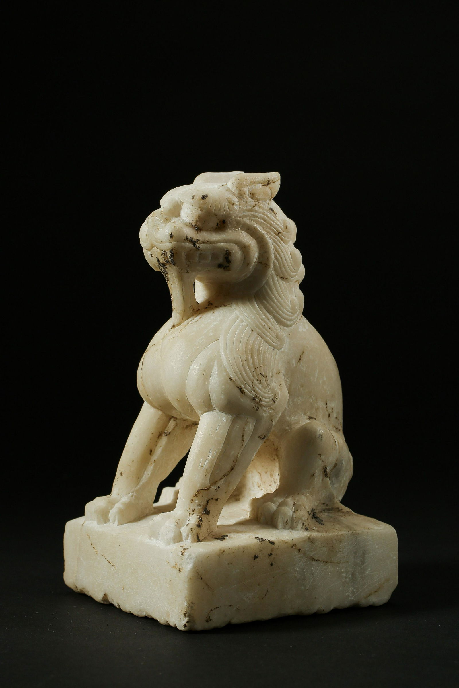 A WHITE MARBLE LION (1 of 5)