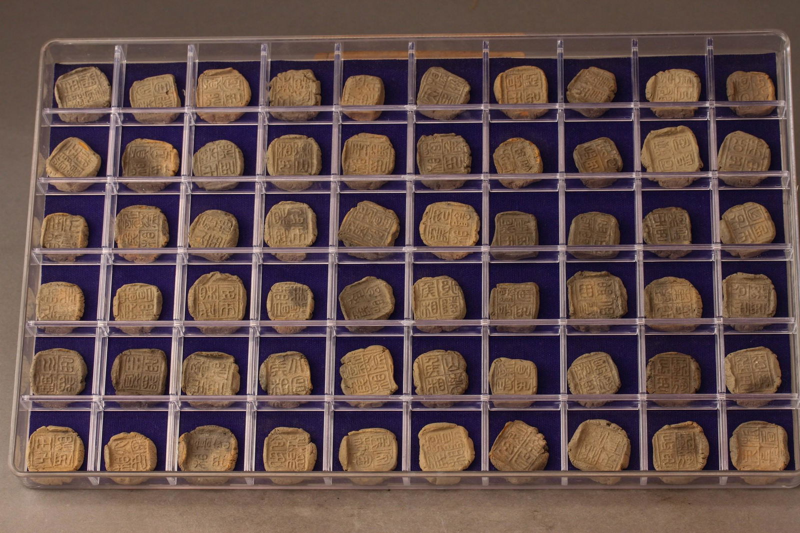 A GROUP OF  60 STAMP SEALS (1 of 7)