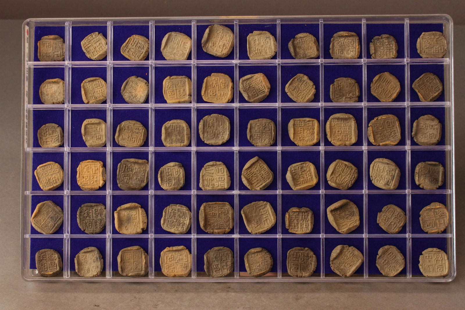 A GROUP OF  60 STAMP SEALS (1 of 7)