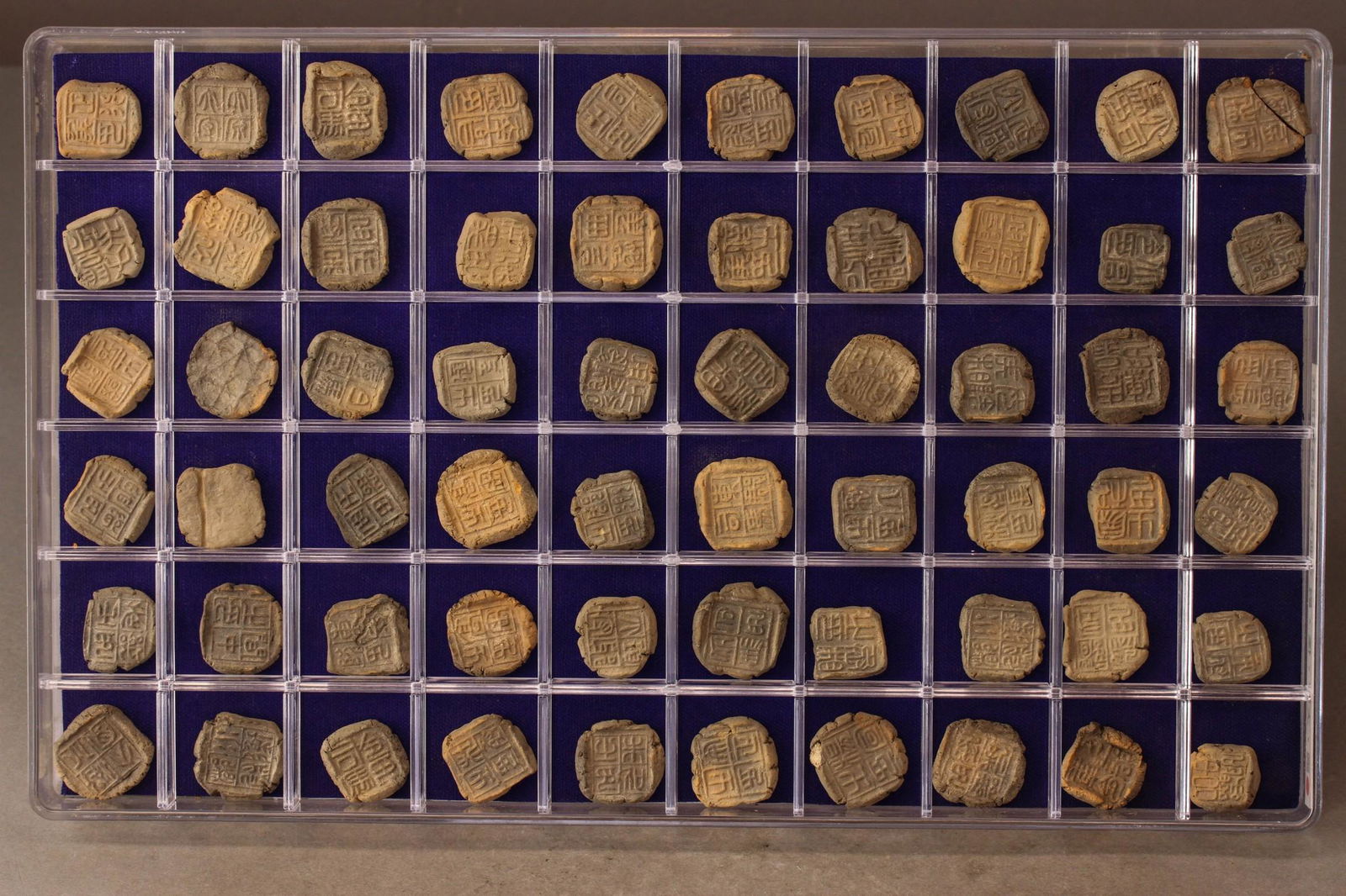 A GROUP OF  60 STAMP SEALS (1 of 7)