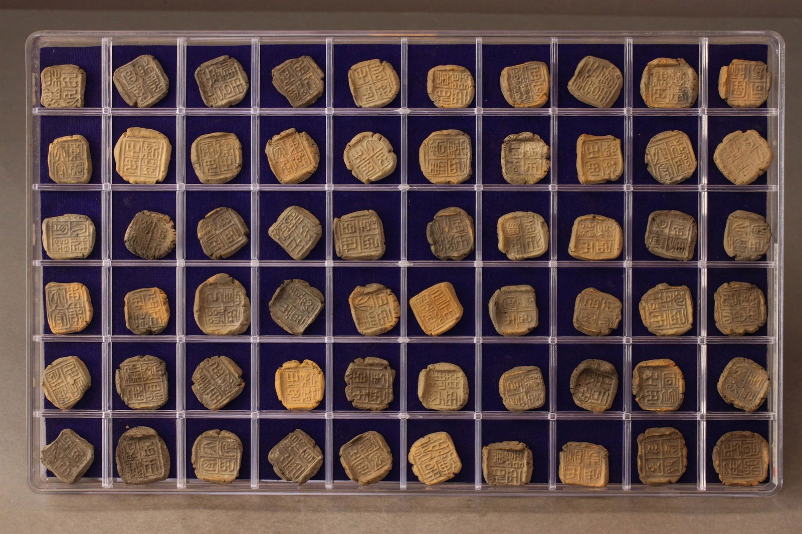 A GROUP OF  60 STAMP SEALS (1 of 7)