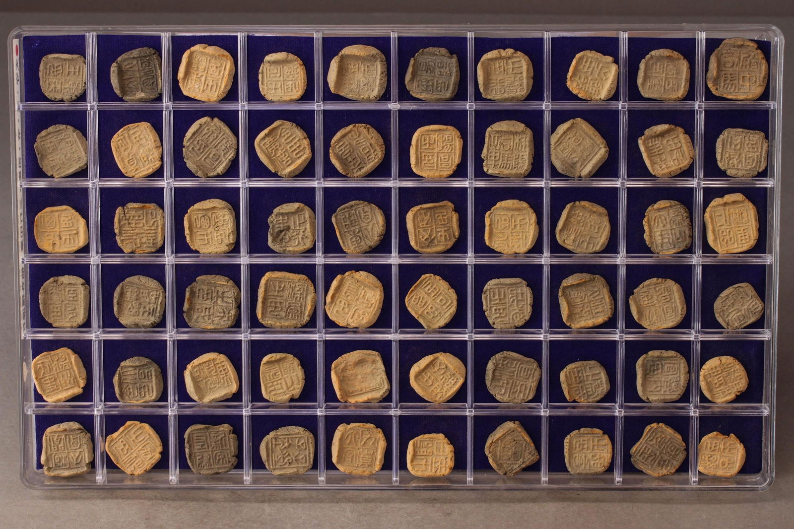 A GROUP OF  60 STAMP SEALS (1 of 7)