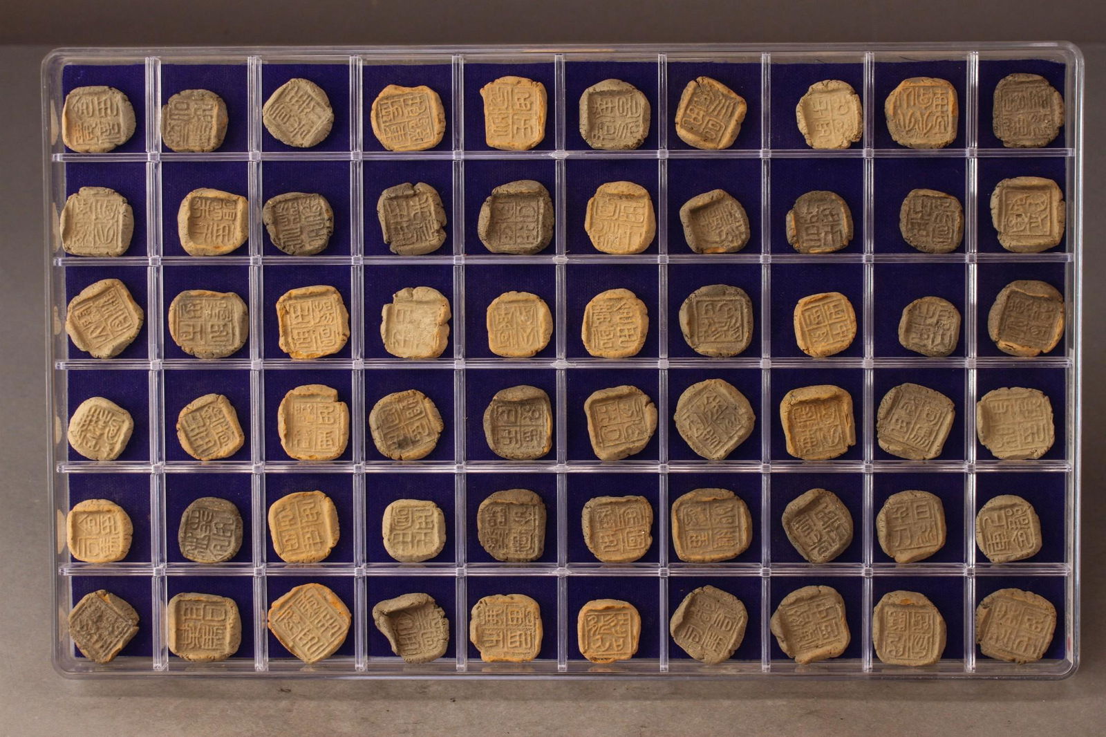 A GROUP OF  60 STAMP SEALS (1 of 7)