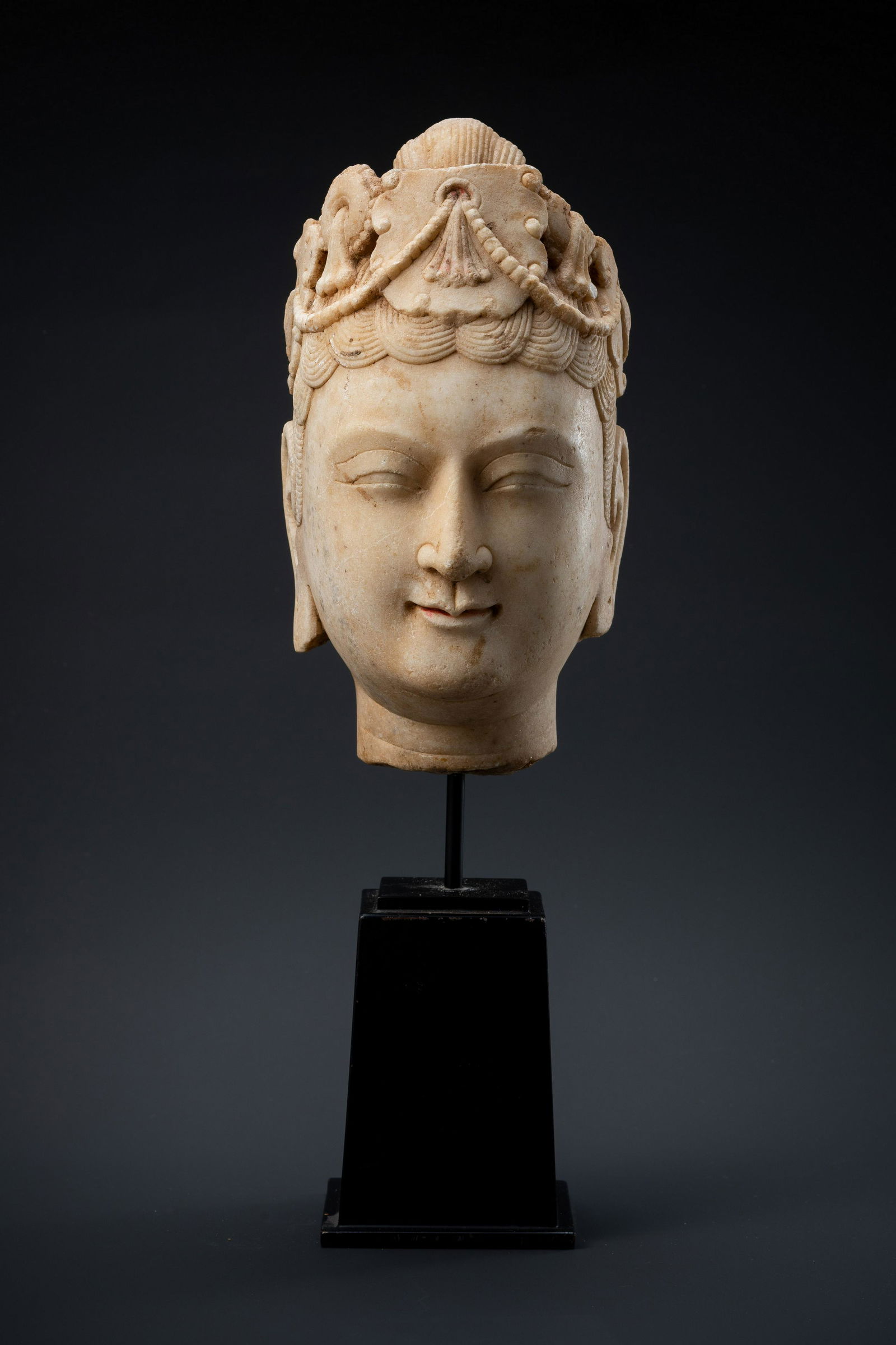 A MASSIVE STONE HEAD OF BUDDHA (1 of 3)