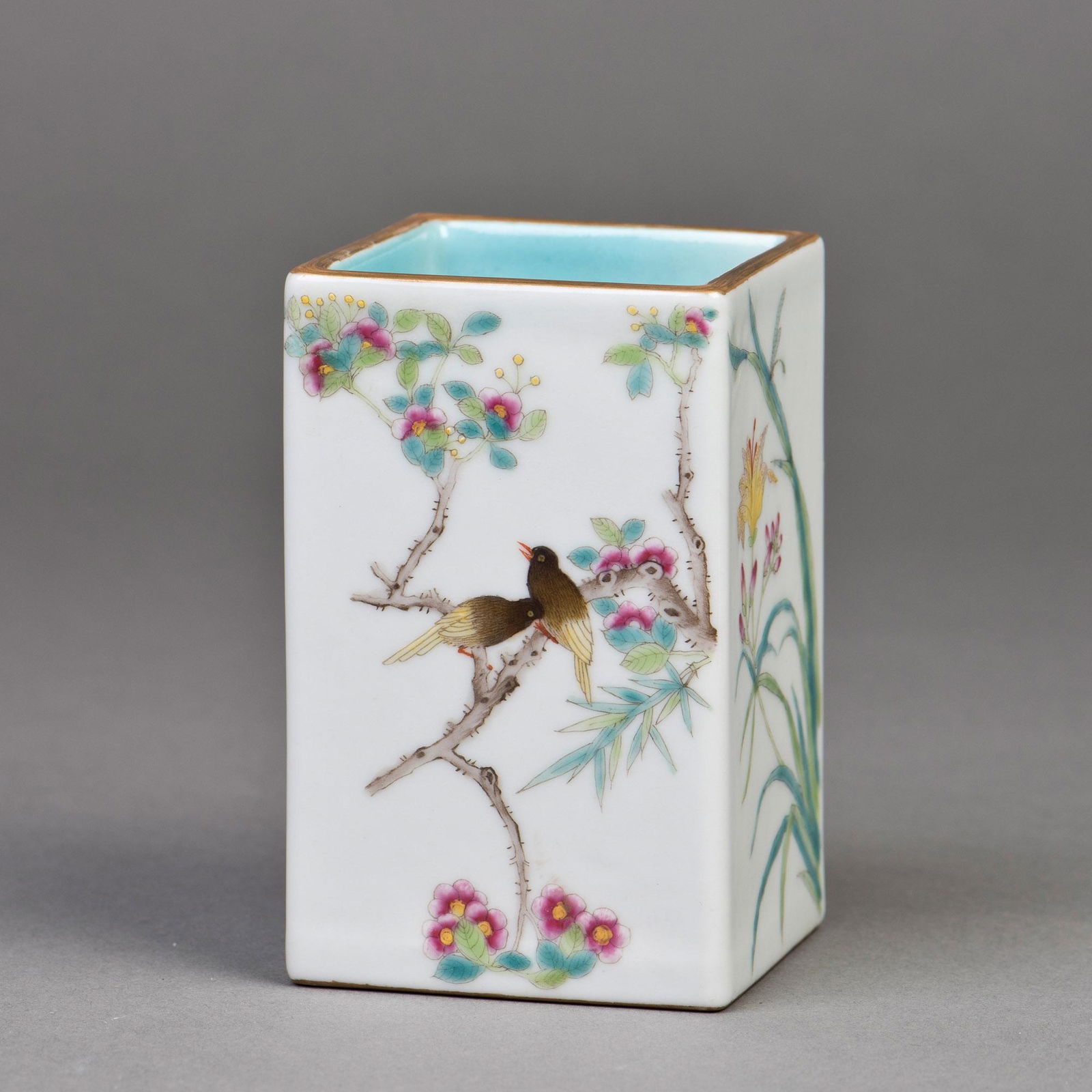 A PAIR OF SQUARE FAMILLE ROSE PORCELAIN BRUSH POTS (1 of 5)