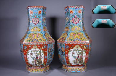 A  PAIR OF FAMILLE ROSE FLOWER AND BIRD HEXAGONAL VASES