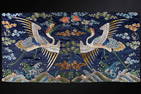 AN EMBROIDERED BLUE-GROUND RANK BADGES OF RED-CROWNED CRANE, BUZI