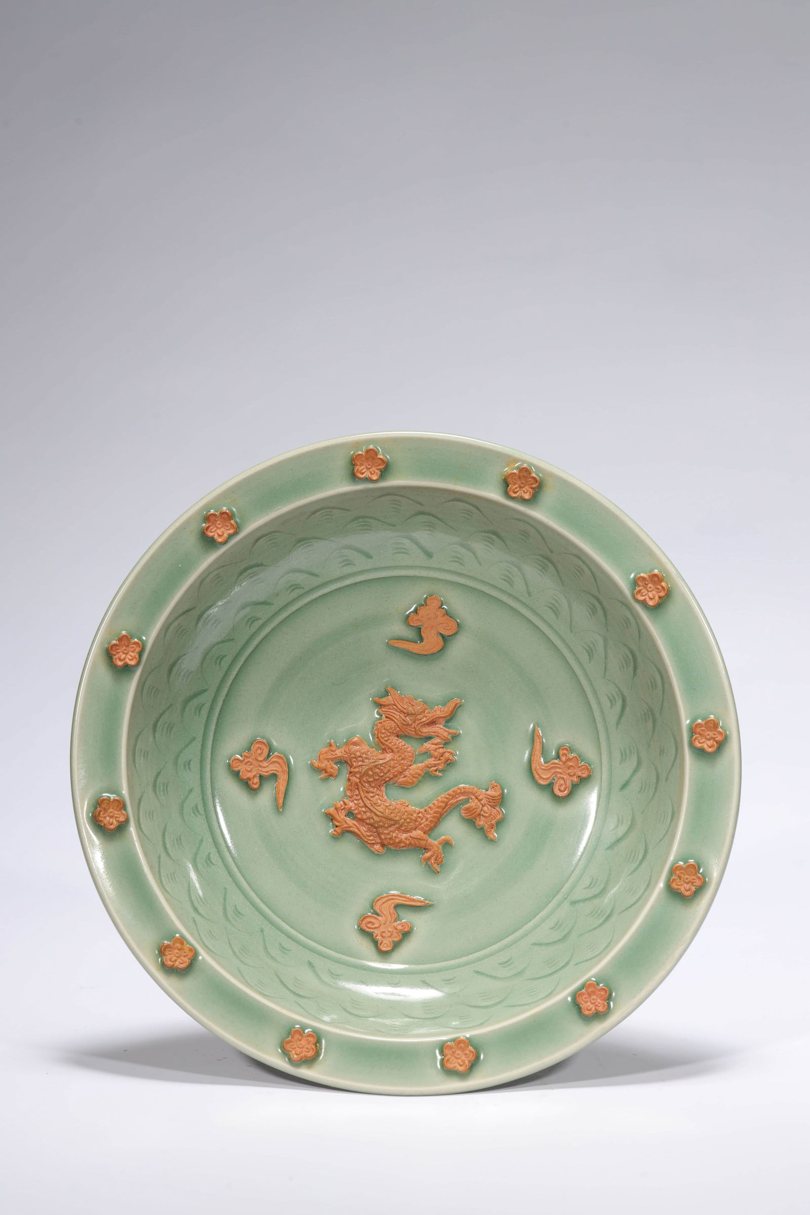 A CELADON GLAZE DRAGON AND FLOWER DISH (1 of 3)