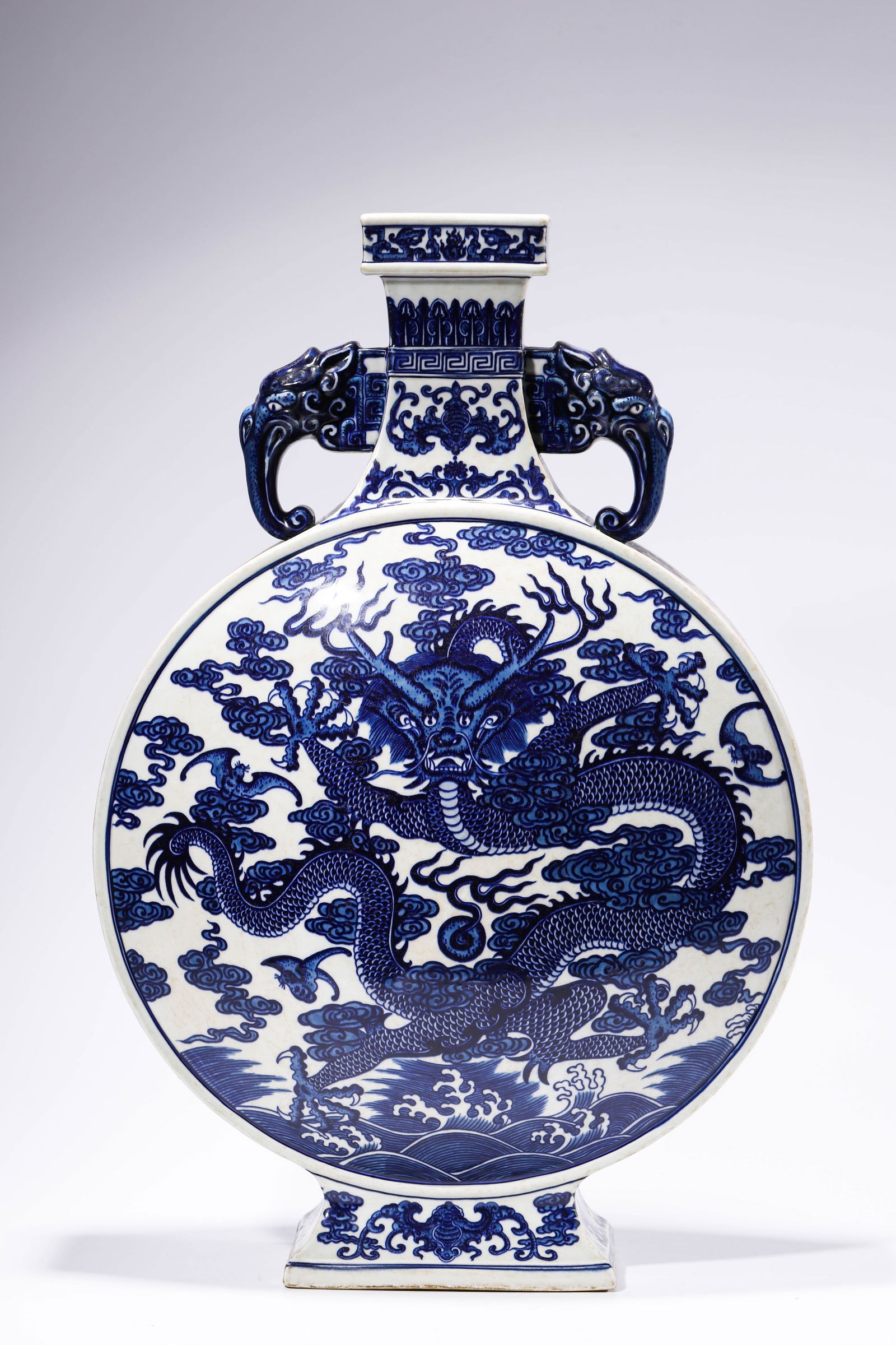Blue and White Cloud Dragon Elephant Ear Square Mouth Moon Flask: Blue and White Cloud Dragon Elephant Ear Square Mouth Moon Flask Dimension: Length: 42.9cm (16 7/8 in.), Width: 19.9cm (7 13/16 in.), Height: 65.3cm (25 11/16 in.) All measurements are approximate.