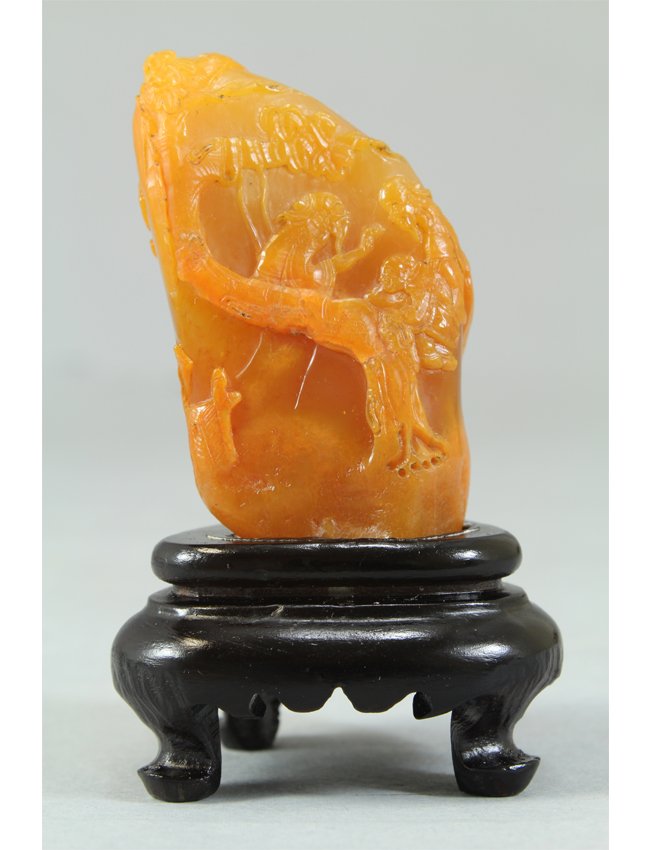 Craved Soapstone (TianHuang): Carved Soapstone (TianHuang), China, craved with figures in a landscape, stone of caramel-honey color. A Bayside Collector. Length 2" Height 3"