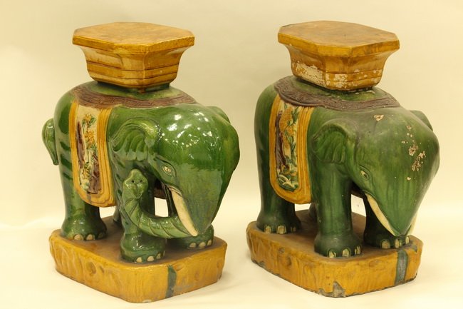 Pair of large, hand painted elephant figures: Princely pair of large, hand painted elephant figures with heads bowed and trunks coiled and long white tusks. Beautifully rendered. Late Qing period. Length 21" Height 22"