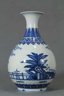 Exquisite blue and white porcelain vase: Exquisite blue and white porcelain vase. Design features palm fronds at the neck, dragonflies, trees and a ruyi border with TongZhi mark on base. Length 7.5" Height 12.5"