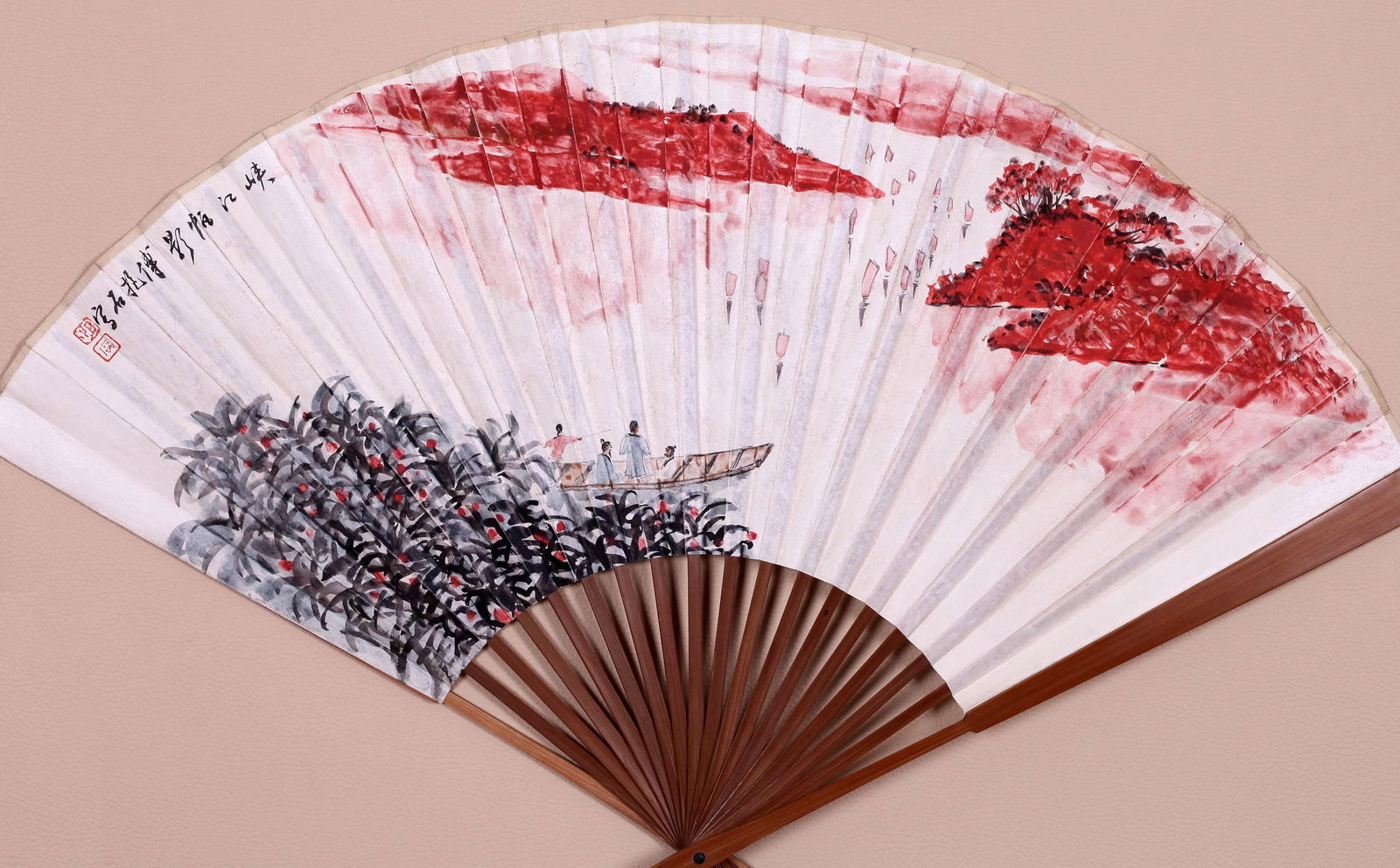 ATTRIBUTED TO FU BAOSHI AND GUAN SHANYUE, PAINTING AND CALLIGRAPHY FAN: Attributed to Fu Baoshi (1904-1965) and Guan Shanyue (1912-2000), Painting and Calligraphy Fan. Ink and color on paper, folding fan. 19 x 51 cm (each side). Condition: Creases and stains on the mounti