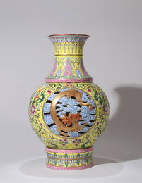 A YELLOW-GROUND FAMILLE-ROSE RETICULATED 'DRAGON' VASE