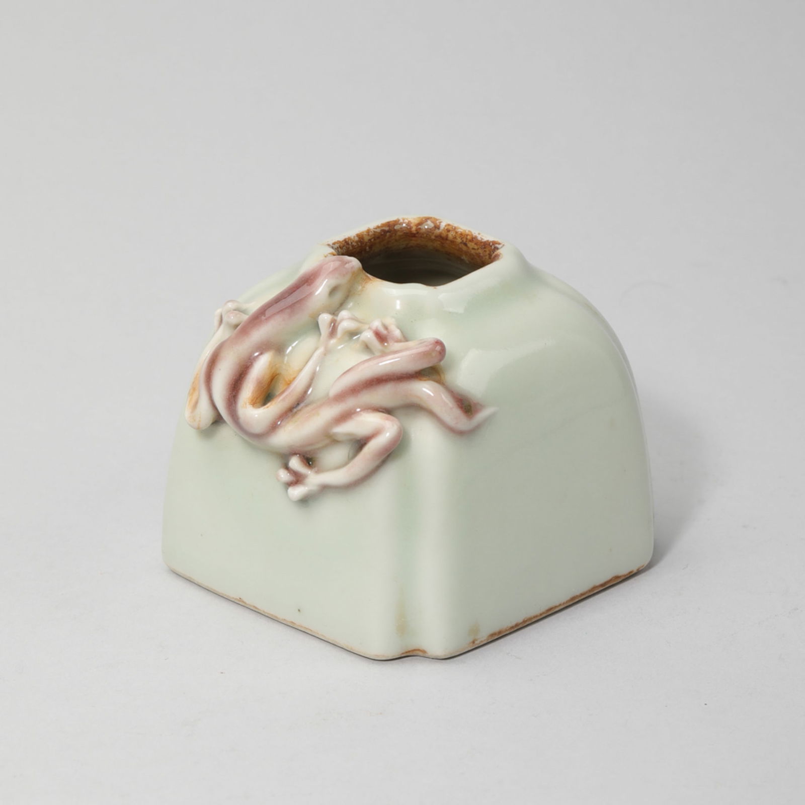 COPPER RED GLAZE AND CELADON GLAZE WATER COUPE: Copper red glaze and celadon glaze water coupe. Height: 5.4 cm, Width: 5.5 cm.