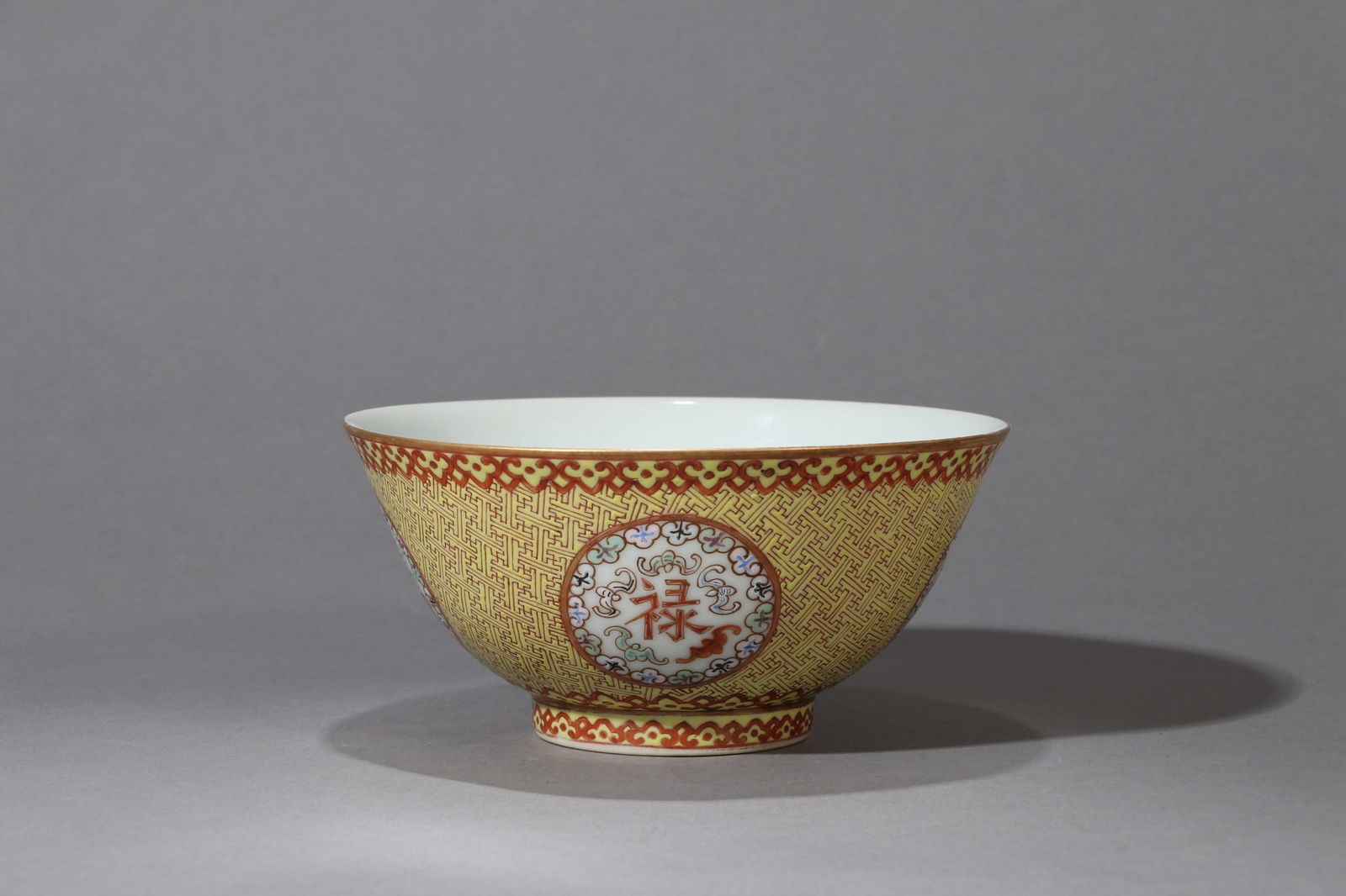 A FAMILLE-ROSE BOWL: A famille-rose bowl decorated with 'Fu Lu Shou Xi' design. Diameter 15 cm, Height 7 cm.