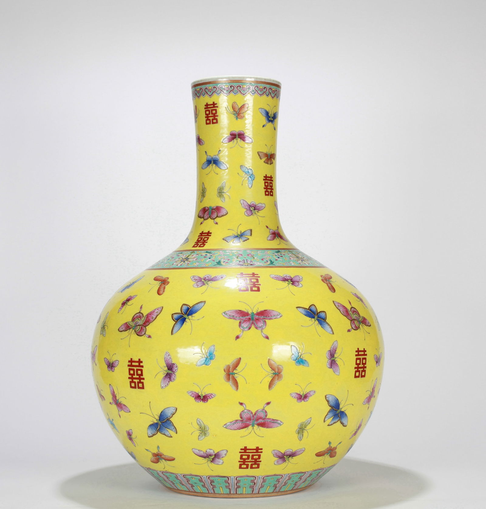A YELLOW-GROUND FAMILLE-ROSE 'BUTTERFLY' TIANQIU VASE (1 of 13)