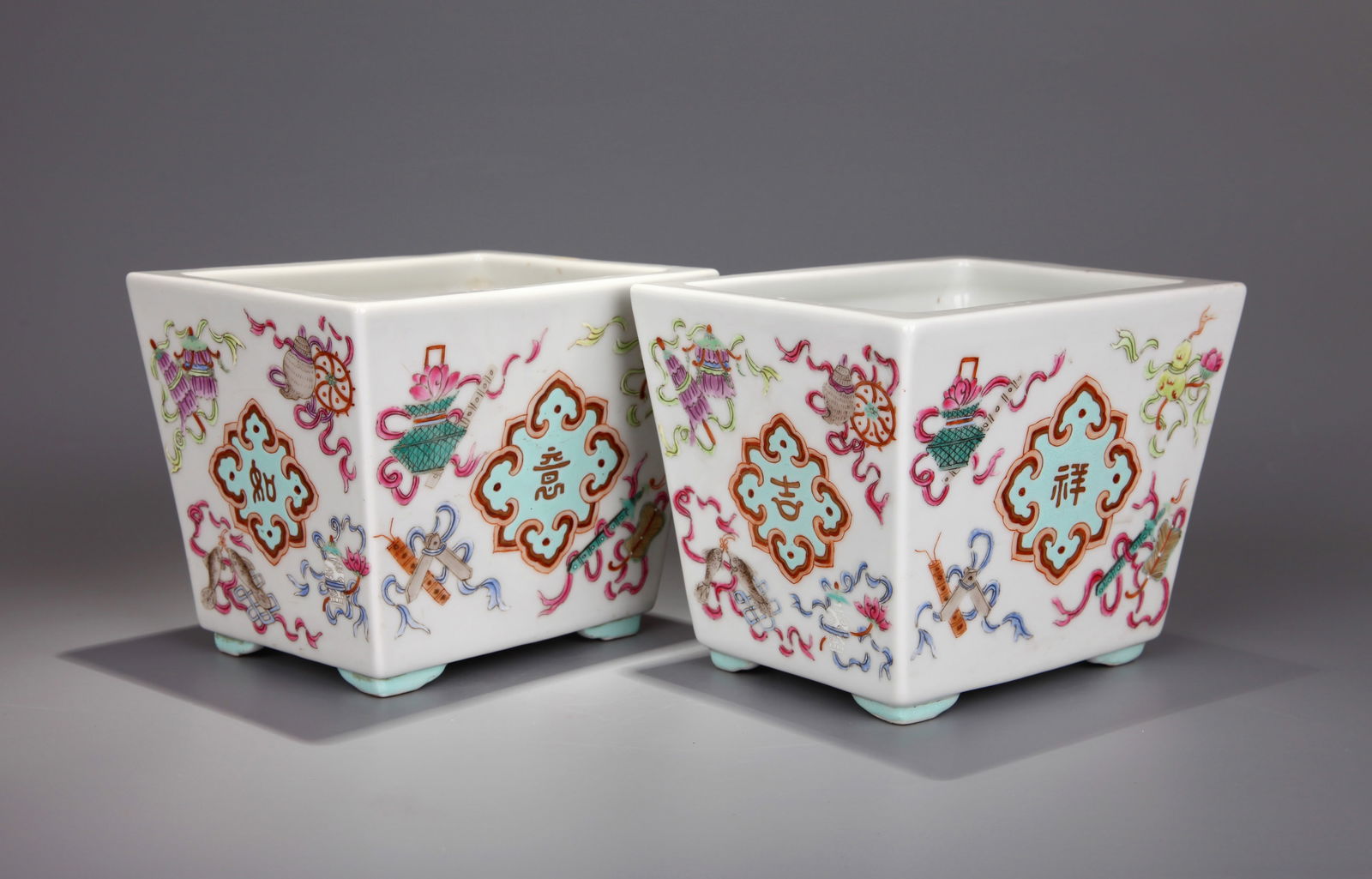 A PAIR OF FAMILLE-ROSE JARDINIERES (1 of 8)