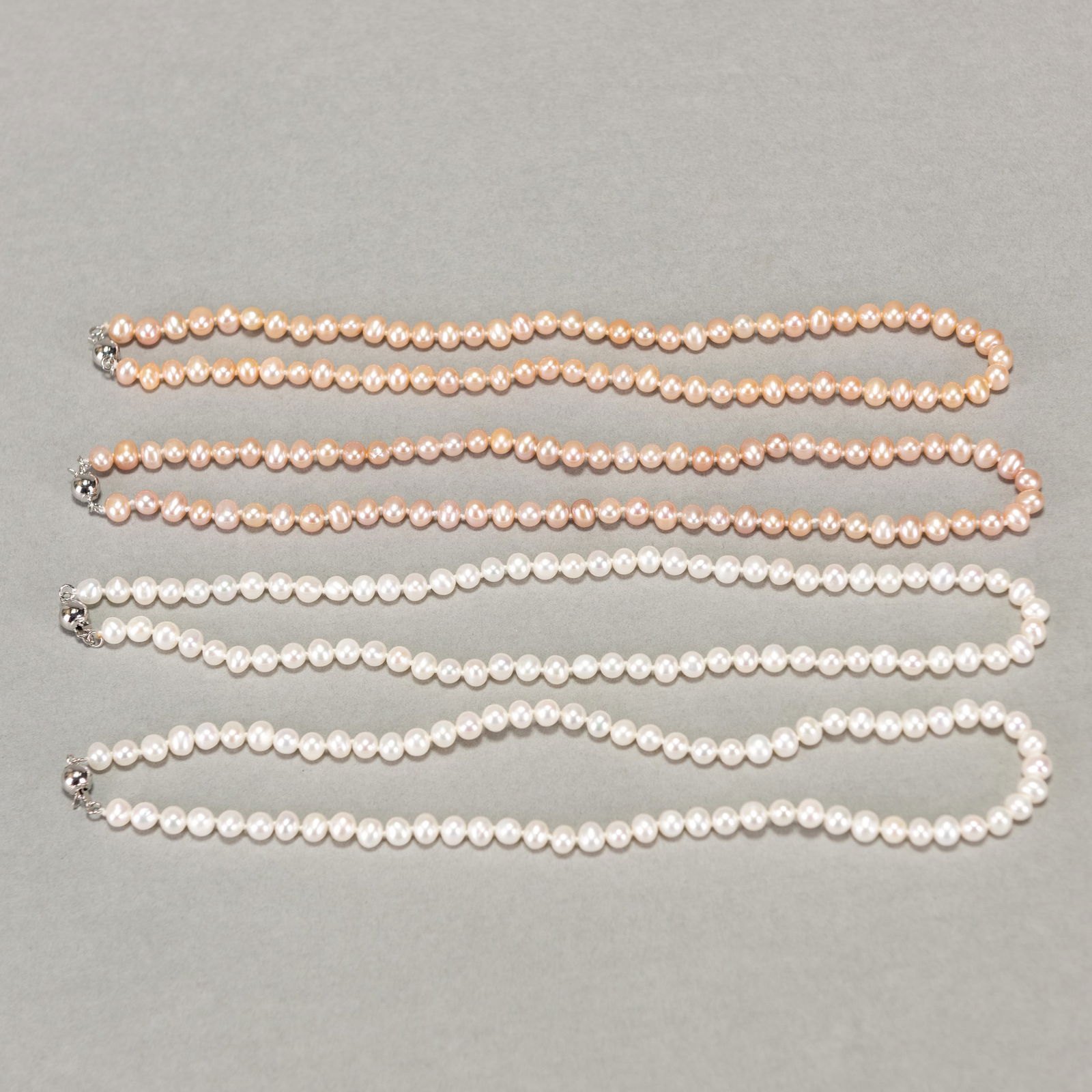 Four Strands of White, Pink and Peach Pearl Necklaces (1 of 3)