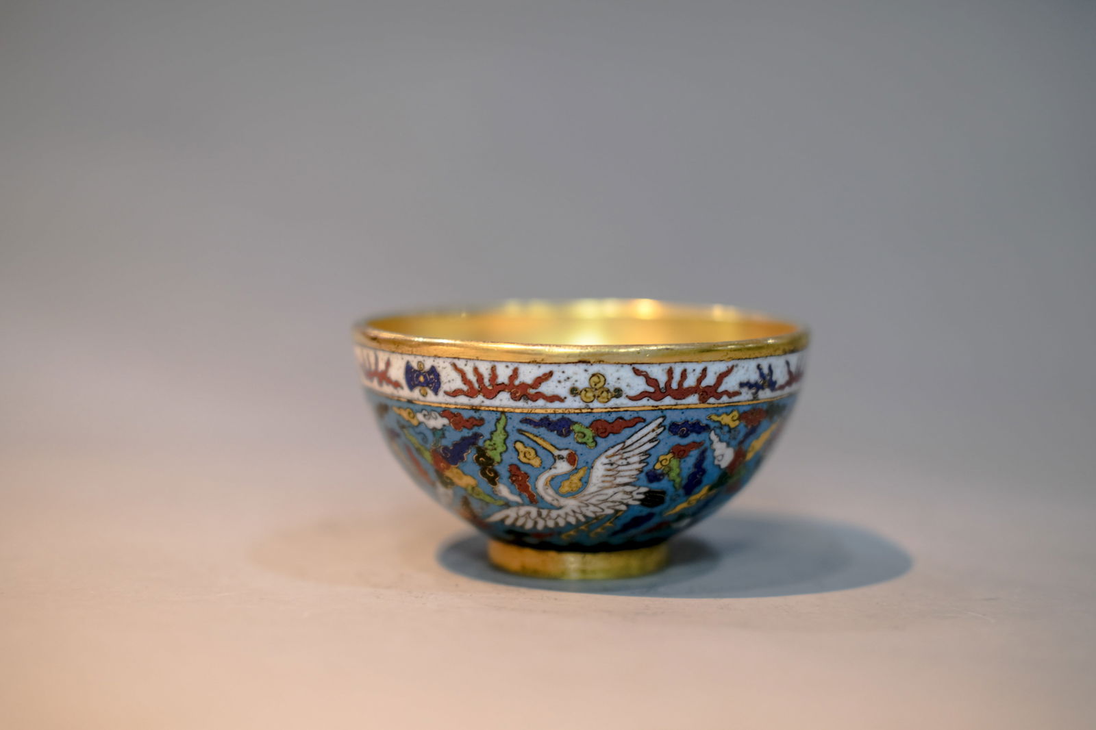 CLOISONNE ENAMEL CRANE AND LONGEVITY BOWL: Cloisonne enamel crane and longevity bowl.Dimensions: Height: 5.5 cm, Diameter: 10.2 cm.